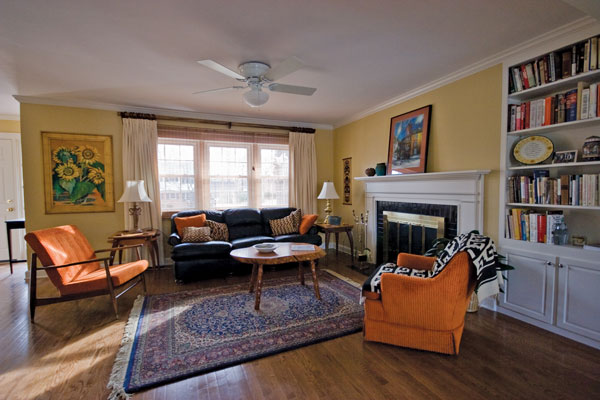 
AFTER. The living room is transformed with Ace Hardware's low-VOC paint, luscious hemp window treatments, updated used furniture and original artwork.
